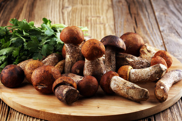 raw mushrooms on wooden table. organic fresh mushrooms