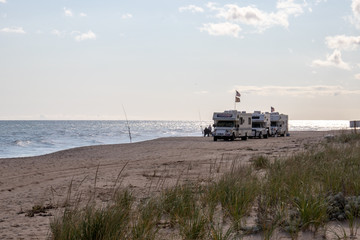 recreational vehicles on a sandy beach in Long Isalan