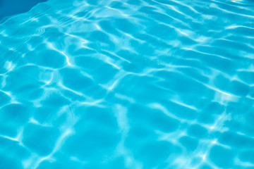 Naklejka na ściany i meble water in the pool background