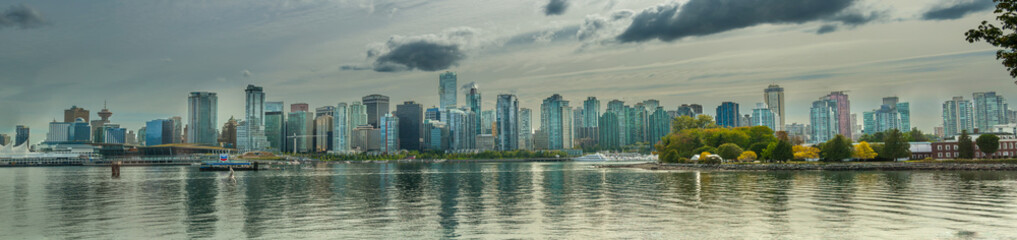 Fototapeta na wymiar Vancouver, Canada Skyline across the water in September