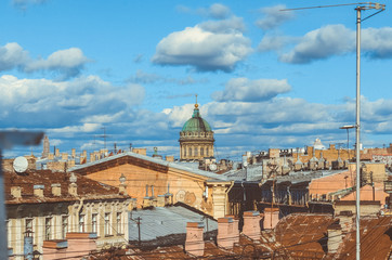 Fototapeta na wymiar View of Kazan Cathedral from the roofs of St. Petersburg