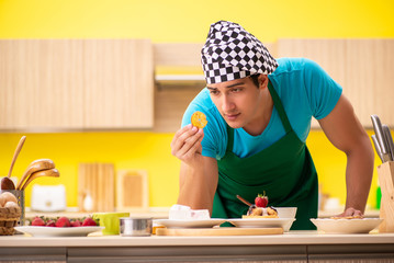 Man cook preparing cake in kitchen at home