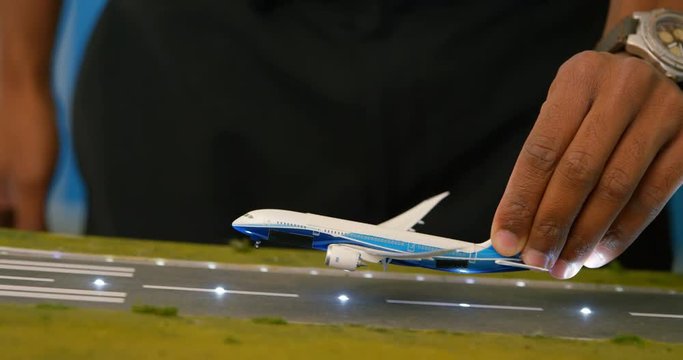 Male pilot training about model plane 4k