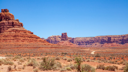 Iconic Southwest US desert brown sandstone monument in the former Bears Ear National Monument located in the Valley of the Gods, Mexican Hat, Utah