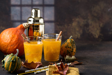 Fall Thanksgiving and Halloween Cocktail. Pumpkin Cocktail.