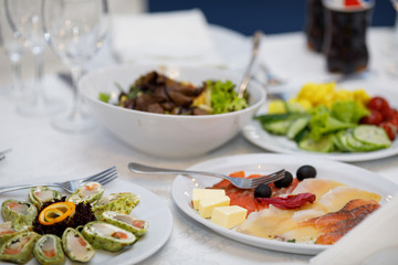 Served dishes to the table for holiday. Design a festive Banquet