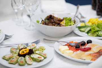 Served dishes to the table for holiday. Design a festive Banquet