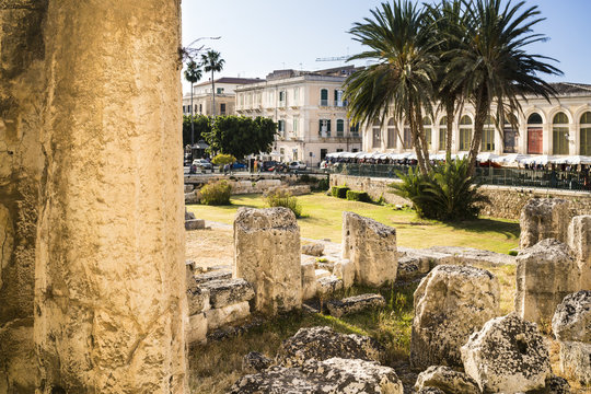 Piazza Emanuele Pancali on Ortigia Island with Roman ruins, Syracuse, Sicily, Italy