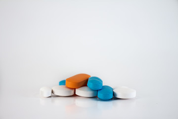 Numerous pills or capsules to be ingested orally.
