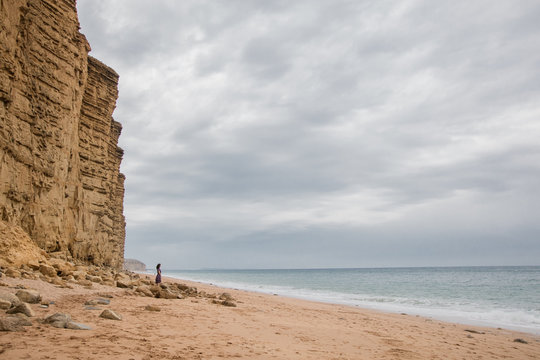 Woman By Cliffs