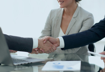 confident handshake of business partners