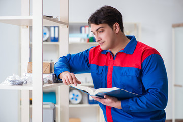 Man working in the postal warehouse