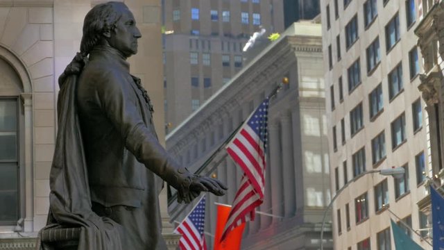 4K (UHD) 25P New Yor City, Lower Manhattan, Wall Street - US flag waving in the wind