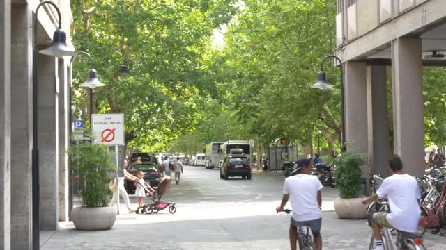 Ravena, Italy Centre, Two Kids Biking.