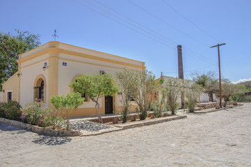 Obraz premium walking on the streets of EL TRIUNFO, a small town located in Baja California Sur, at the bottom can be seen LA RAMONA, a tower made of bricks. MEXICO.