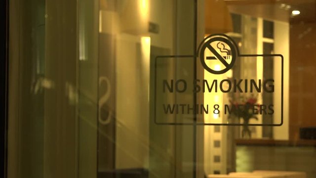 A no-smoking sign within 8 meters at the Zuidas, the wall street of Amsterdam, where bankers and lawyers hold office.