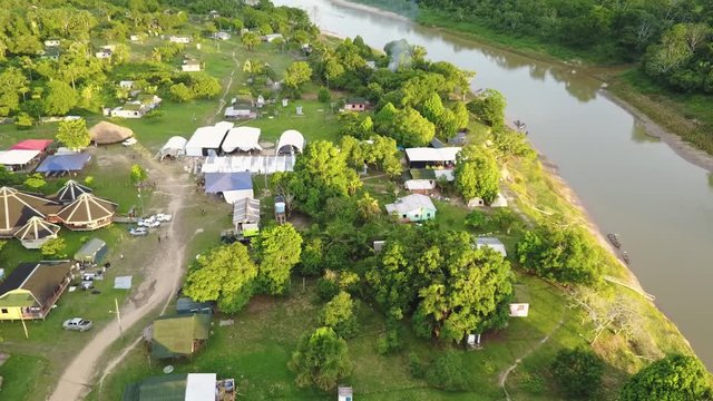 Aerial view of reveal of a Brazillian village in the state of Acre, Nova Morada, Envira river