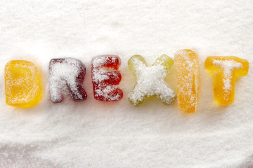 Sugar coated facts and white lies concept with the word BREXIT covered in sugar or sugarcoated