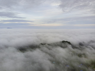 fog covered mountain at morning light