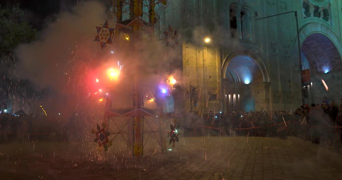 Cuenca, Ecuador / June 2, 2018 - Fireworks Castle - Crowd Stands Close As Sparks Fly