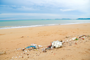 Fototapeta na wymiar Spontaneous garbage dump on a beach