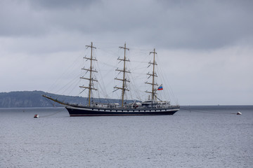 Fototapeta na wymiar The Pallada sailboat in the Bay of Ajax