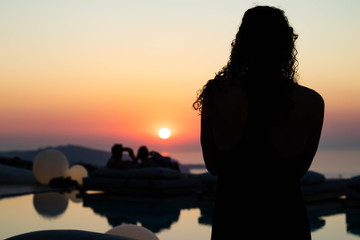 People watching sunset, Santorini, Greece