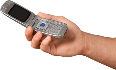 Hand Holding a Mobile Phone - Isolated