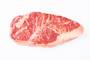 Raw striploin beef steak isolated against white. top view