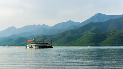 Naklejka premium boat on lake
