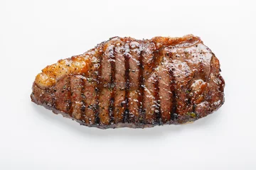 Sierkussen grilled marbled beef steak striploin isolated on white background, top view © Vasiliy