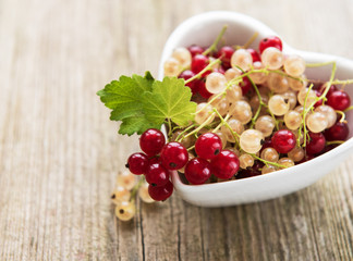 red currants in bowl in the heart shape