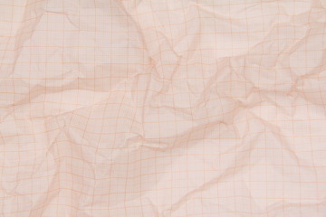 Curled sheet of transparent paper