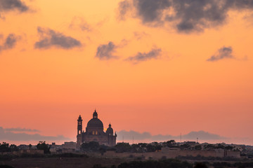Malta - Gozo Island -Church of Saint John the Baptist, Xewkija at sunset