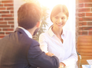 handshake Manager and the client in the office.