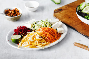 Cooking vegetarian buddha bowl concept spiralized vegetables