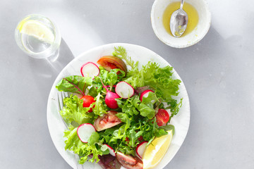 healthy breakfast Fresh plate salad gray concrete background top view