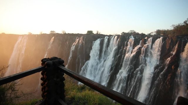 Sunset view of waterfall from mountaintop