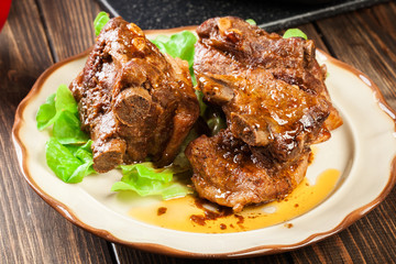 Pork spare ribs served on a plate