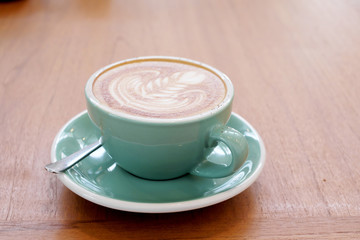 Latte Coffee art on the wooden desk