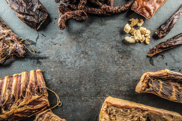 Top of view assortment of smoked pork meat products.