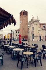 Chioggia, Italy-August 26, 2018: Province of Venice. Cafe on the street.