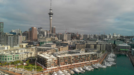 AUCKLAND, NEW ZEALAND - AUGUST 26, 2018: Aerial view of cityscape at sunset. More than 1 million tourists visit Auckland annually