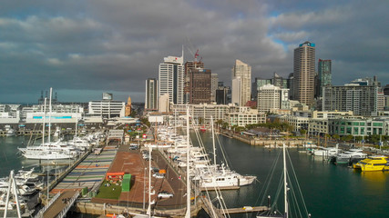 AUCKLAND, NEW ZEALAND - AUGUST 26, 2018: Aerial view of cityscape at sunset. More than 1 million tourists visit Auckland annually
