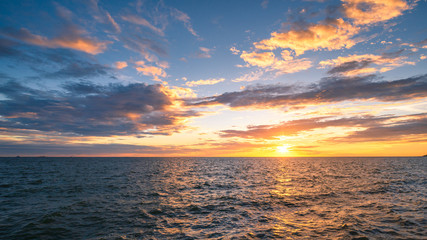 sunset sky on the beach background.