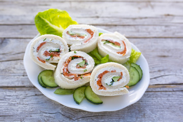 Delicious Italian tramezzini with cream cheese and salmon.
