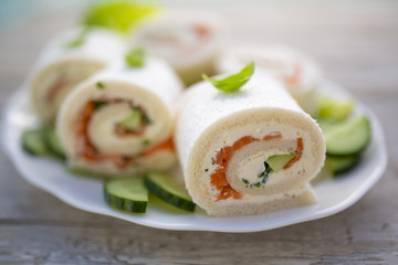 Delicious Italian tramezzini with cream cheese and salmon.
