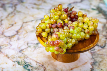 Grapes in a wooden bowl