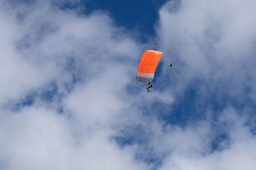 Parachute is in the sky.