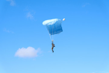 Parachute is in the sky.